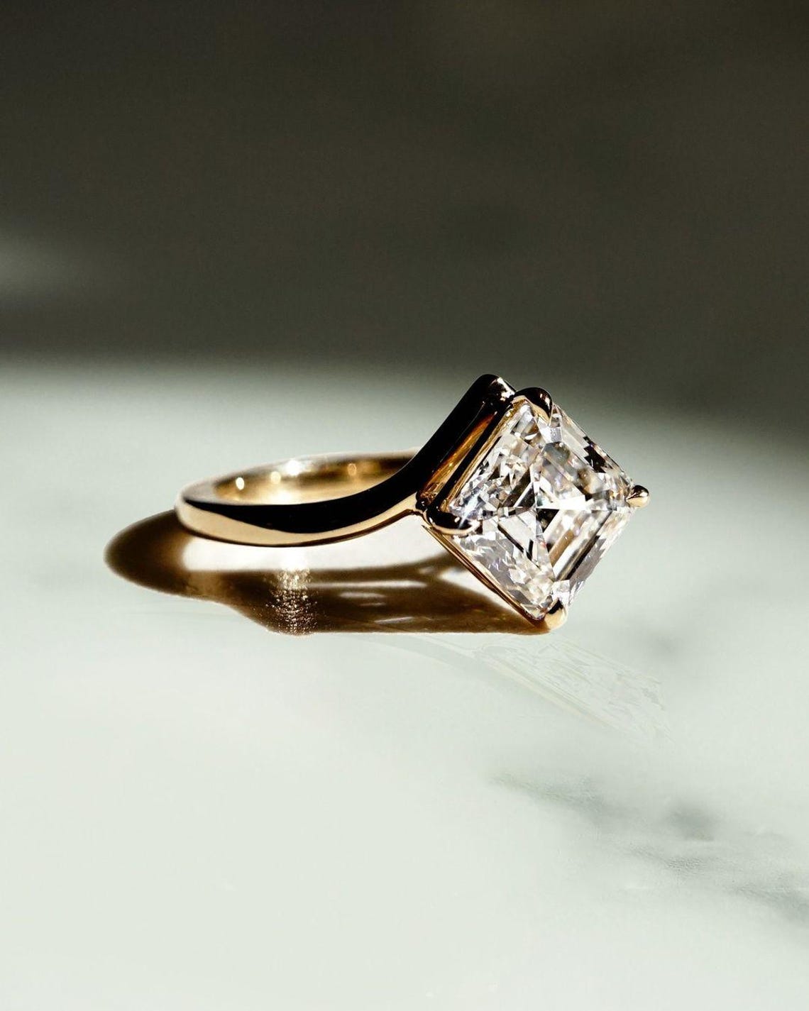 Make her smile with a 3.00 CT Asscher cut engagement ring